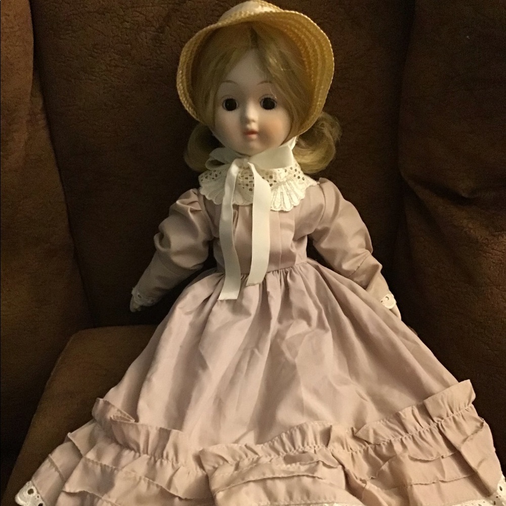 Doll with porcelain face, neck, hands and feet